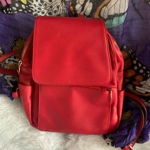 Red Backpack, medium size very roomy inside.